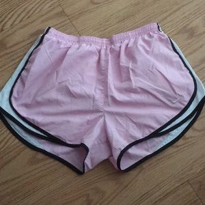 Light pink nike running shorts